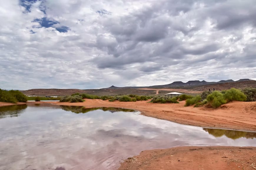 Waterfront and red-sand shoreline at Sand Hollow State Park near Hurricane, Utah
