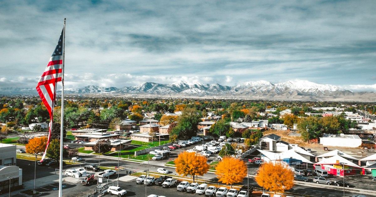 American flag over a Utah town